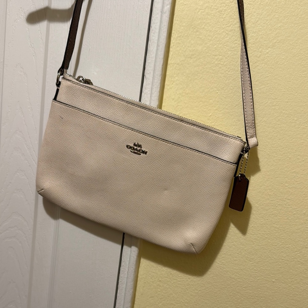 Coach Cream Crossbody Bag with Minimalist Design
